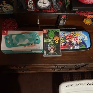 Nintendo Switch Lite handheld game counsel with one game included and case